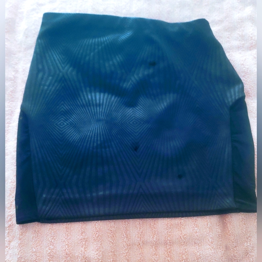 Black Bebe Skirt. It is the perfect skirt for a date or ladies night. Worn once.